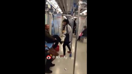 crazy chinese girl spitting on shanghai metro