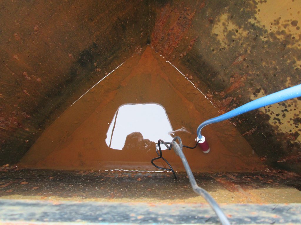 Rusted narrowboat water tank