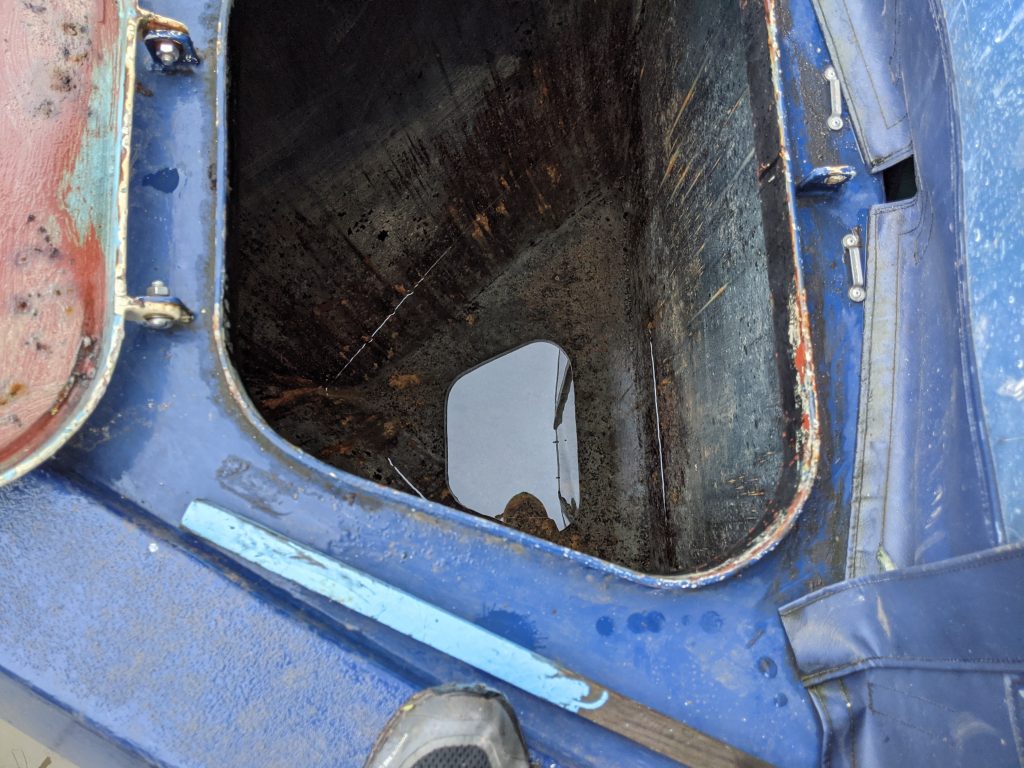 Empty narrowboat water-tank