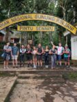 Under the national park sign